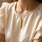 Shalom (peace) gold necklace